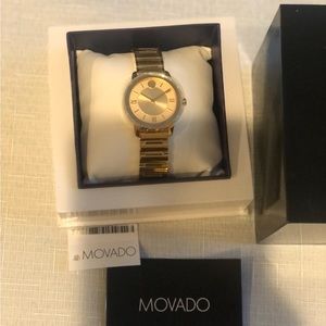 Brand new hood movado watch with box, sticker and tags on